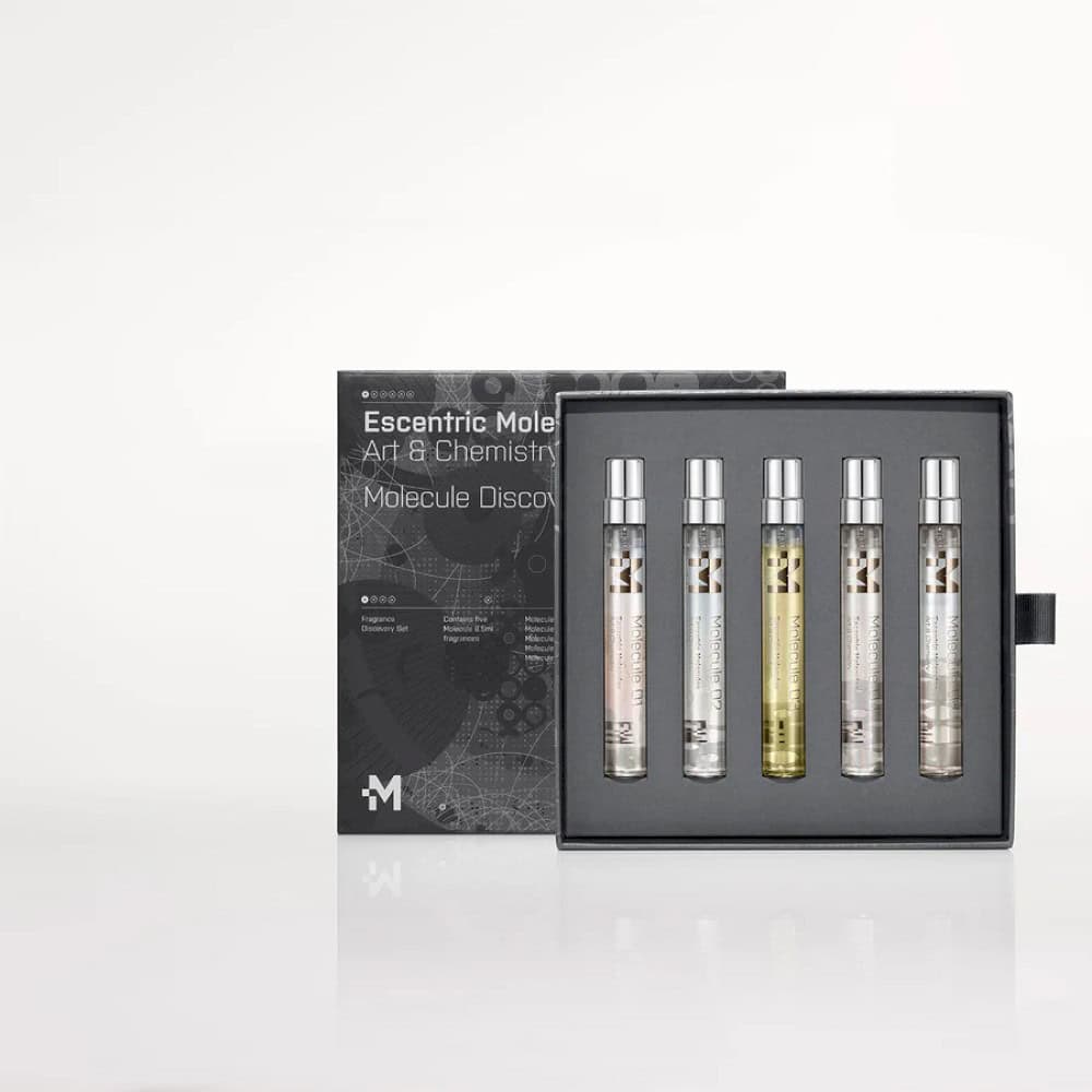 Escentric Molecules Molecule Discovery Set featuring five travel-sized fragrances in sleek silver spray bottles.