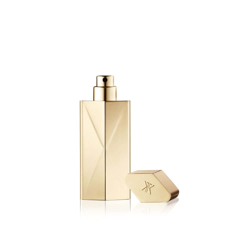 Gold Edition Globe Trotter perfume bottle with cap