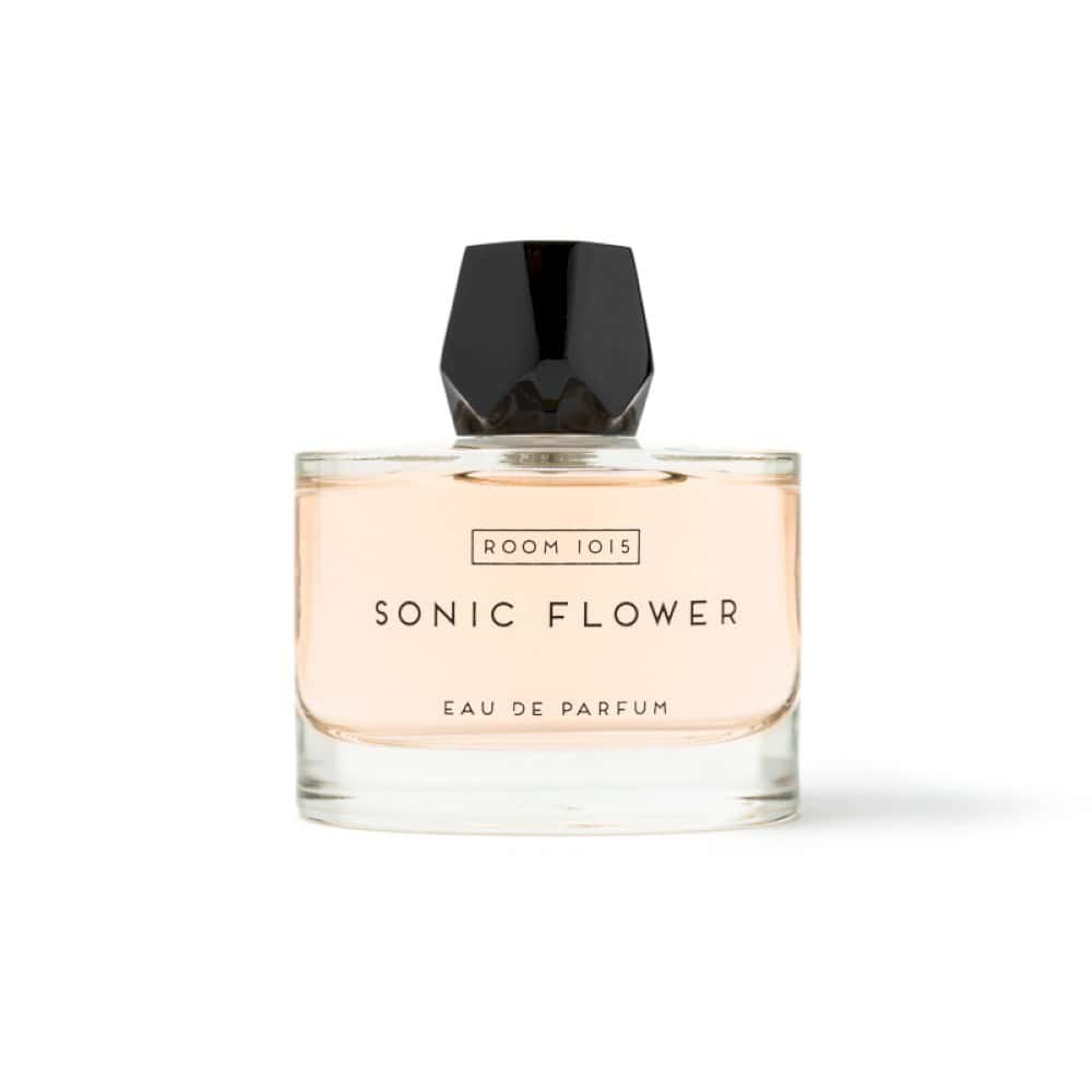 Room 1015 Sonic Flower Eau de Parfum bottle with a black geometric cap and pale pink liquid