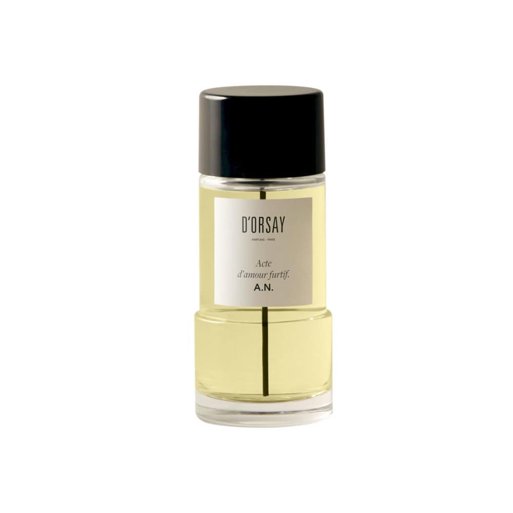 D'Orsay Acte d'amour furtif. A.N. perfume bottle with yellow liquid and black cap