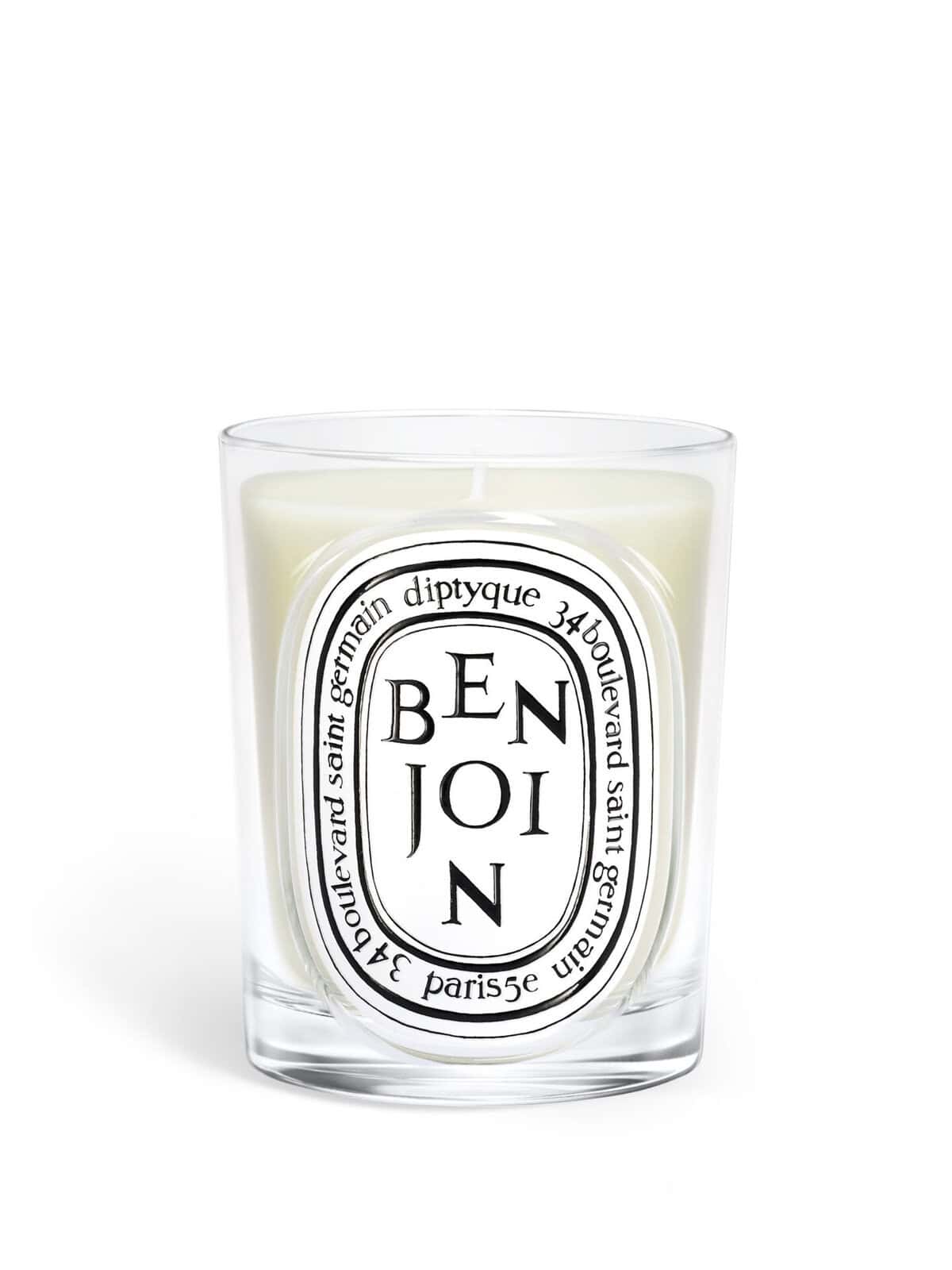 Diptyque Benjoin Classic Candle in a clear glass jar with oval label