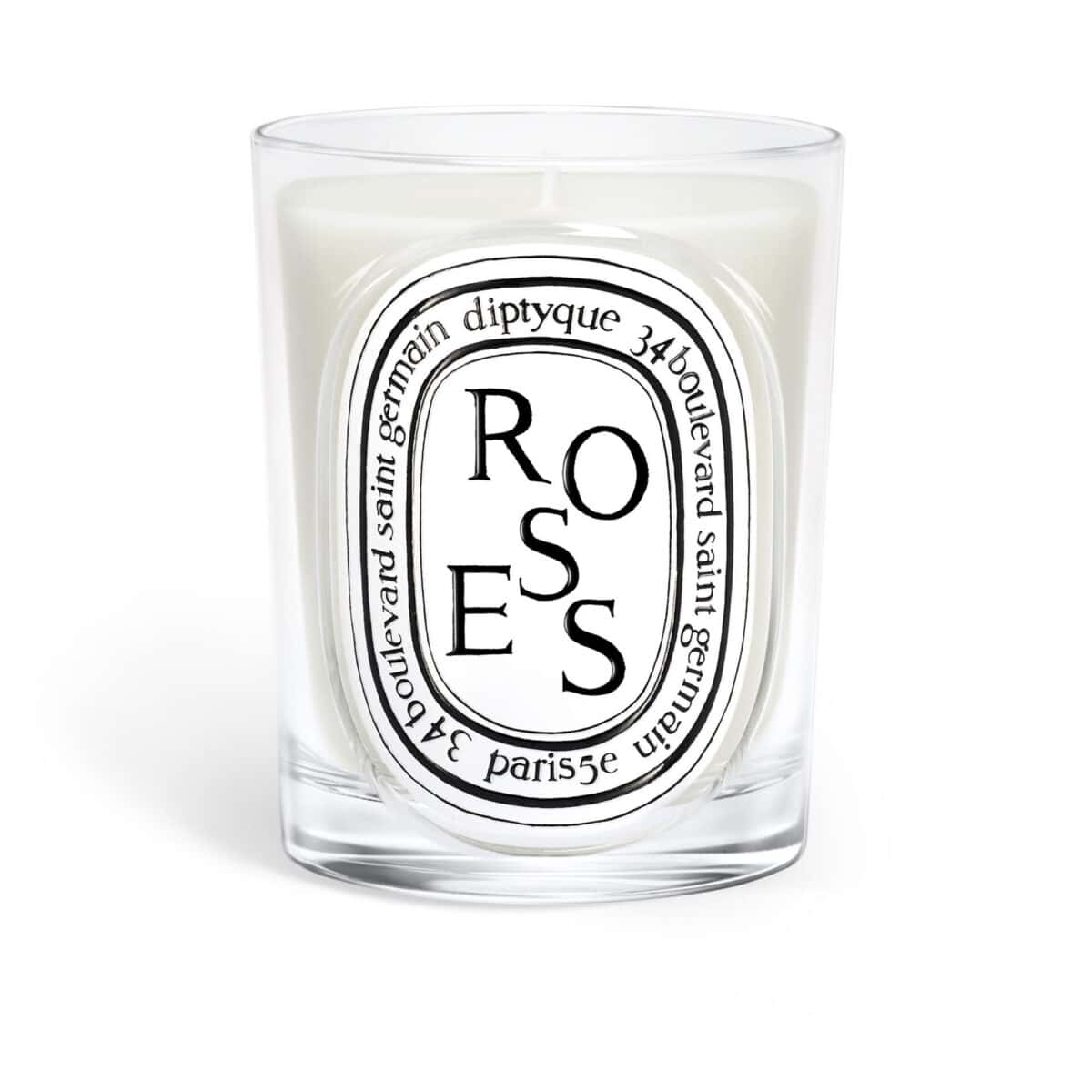 Diptyque Roses Classic Candle in a clear glass jar with oval black and white label
