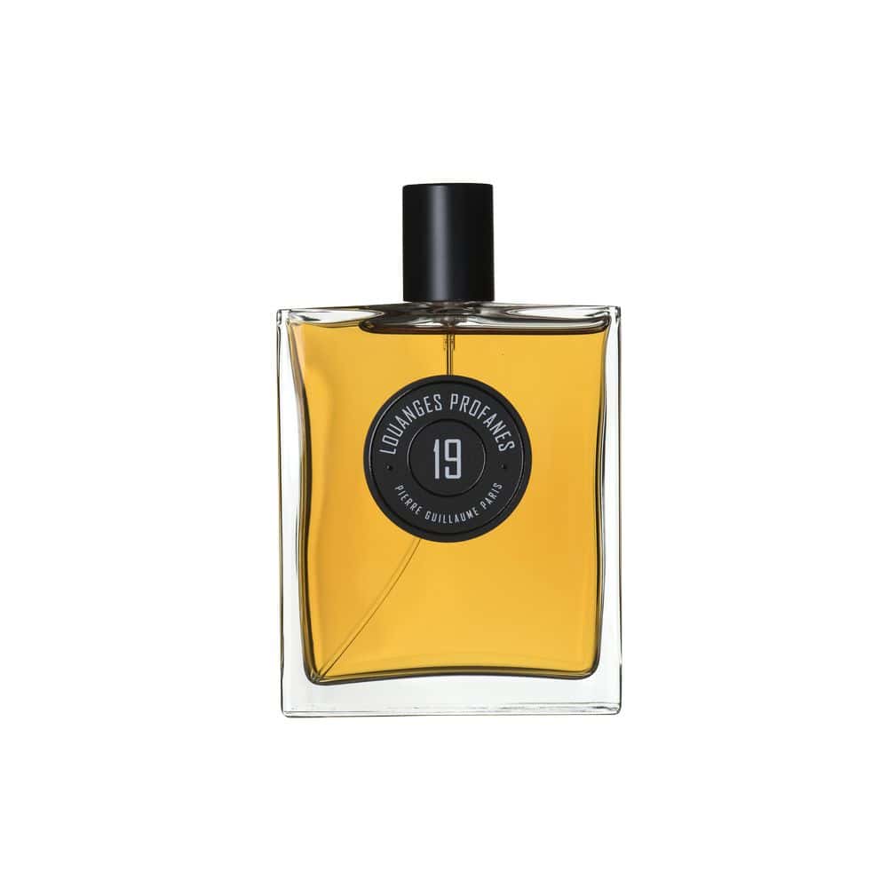 19 Louanges Profanes perfume bottle with amber liquid, black cap, and label