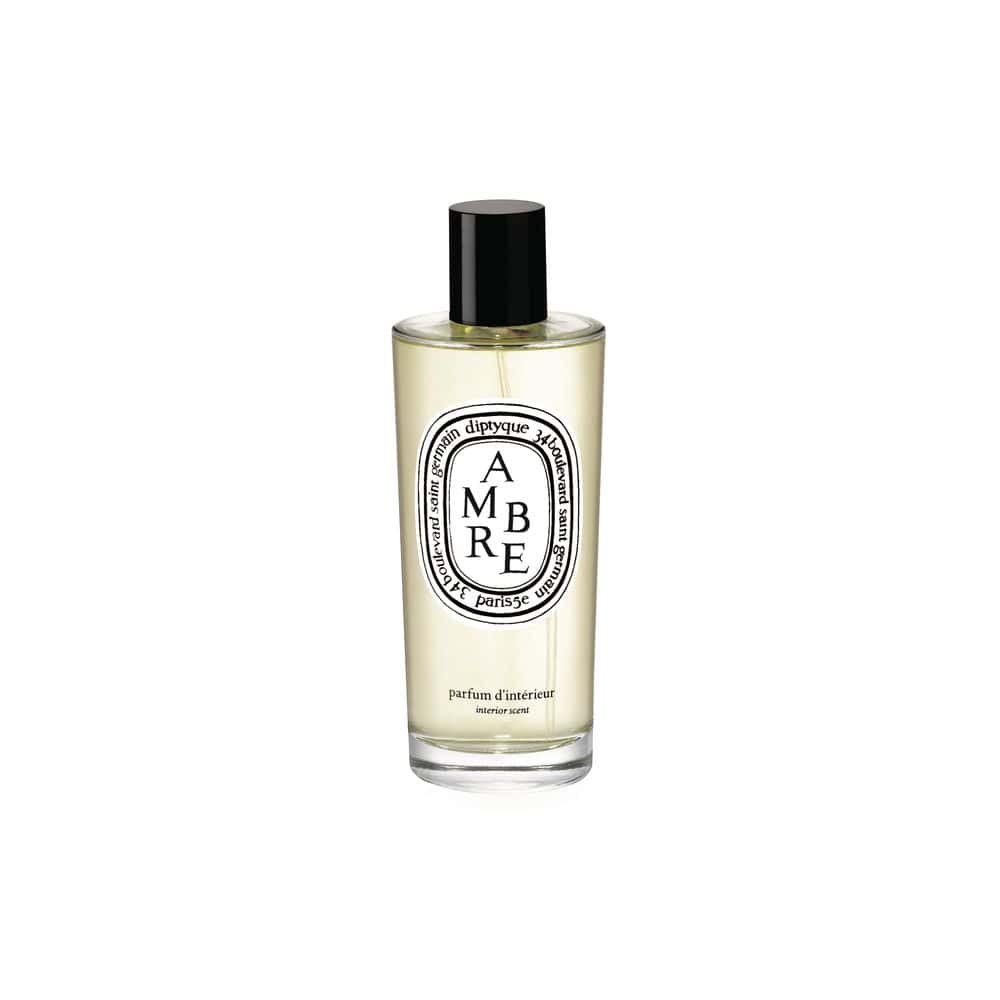 Diptyque Ambre Room Spray: elegant glass bottle with black cap, featuring oval label with "Ambre" and "Paris" text