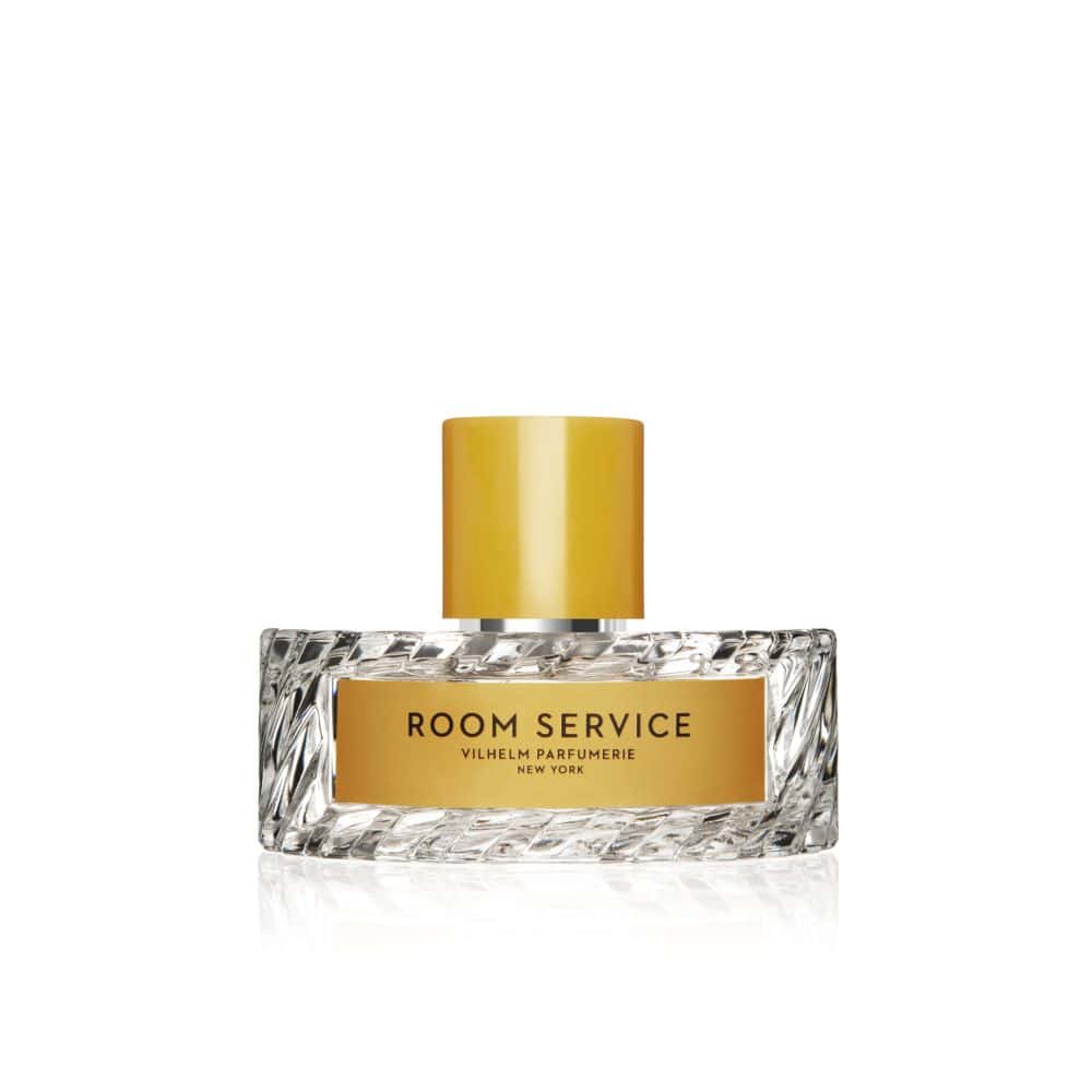 Vilhelm Parfumerie Room Service perfume bottle with a textured glass base and a gold cap.