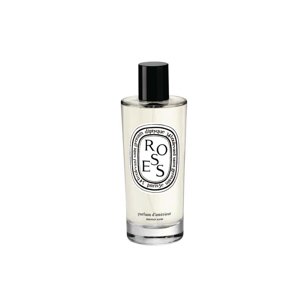 Diptyque Roses interior perfume spray in a clear glass bottle with a black cap