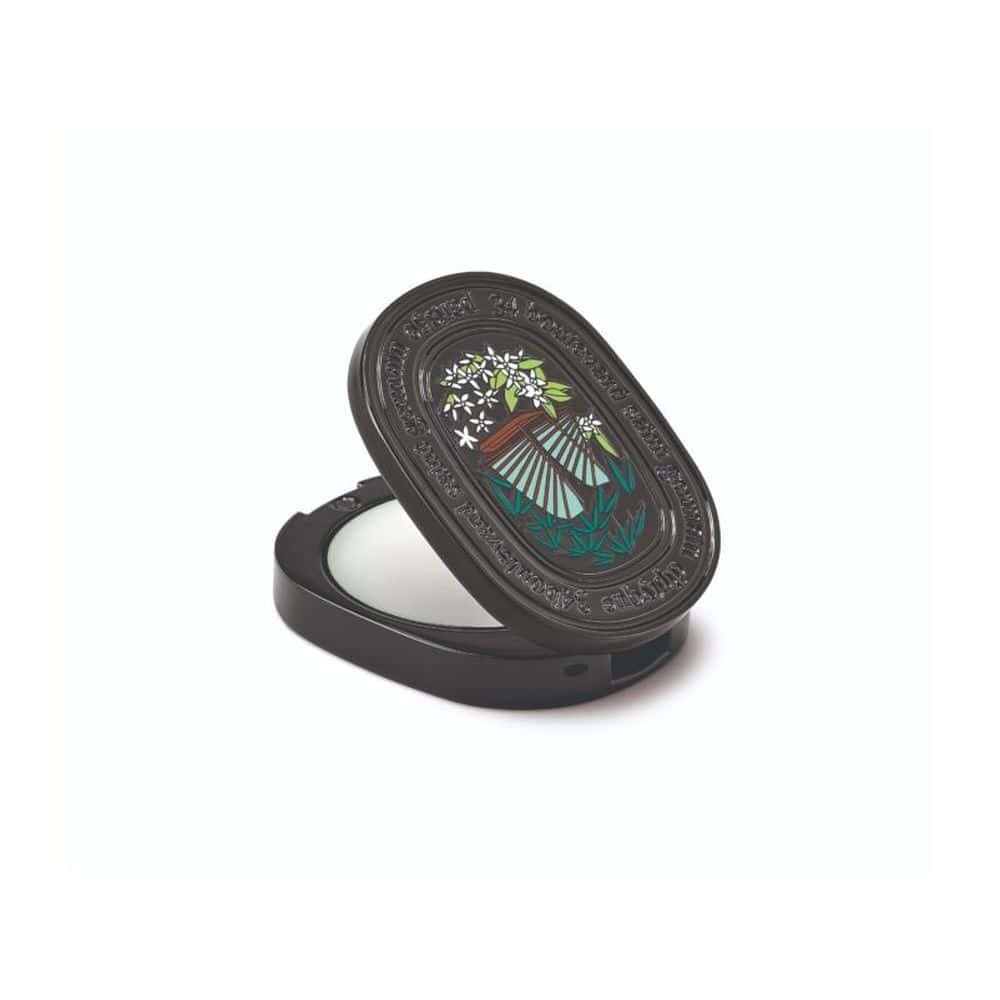 Diptyque Do Son Solid Perfume compact with ornate black lid featuring a floral design